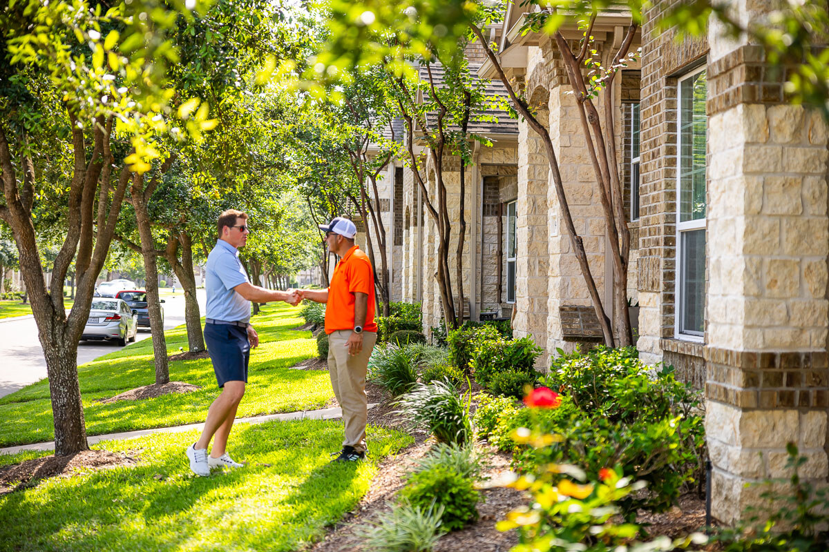 property manager inspects property with account manager