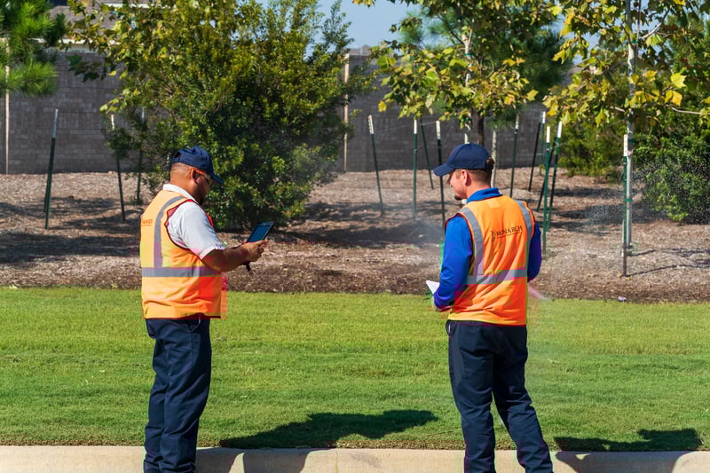 irrigation technicians run sprinkler system zones