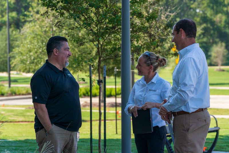 customer meets with commercial landscape managers
