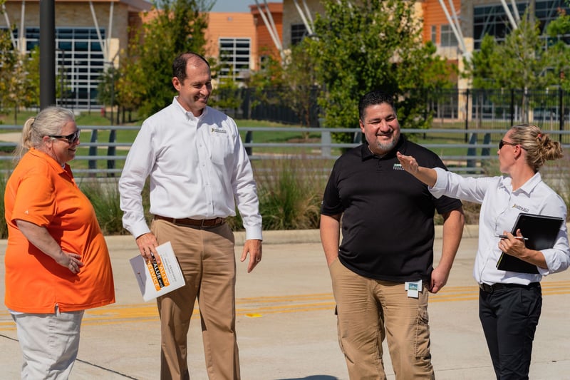 landscape team meets with commercial property manager