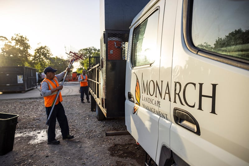 Team-loading-Monarch-landscape-truck