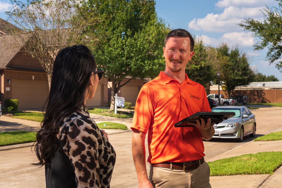 property manager meets with homeowner