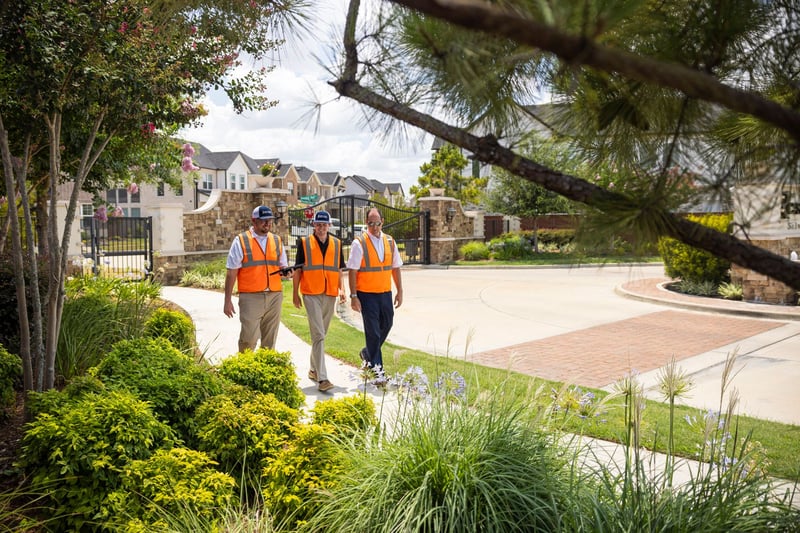 landscape management team inspect property