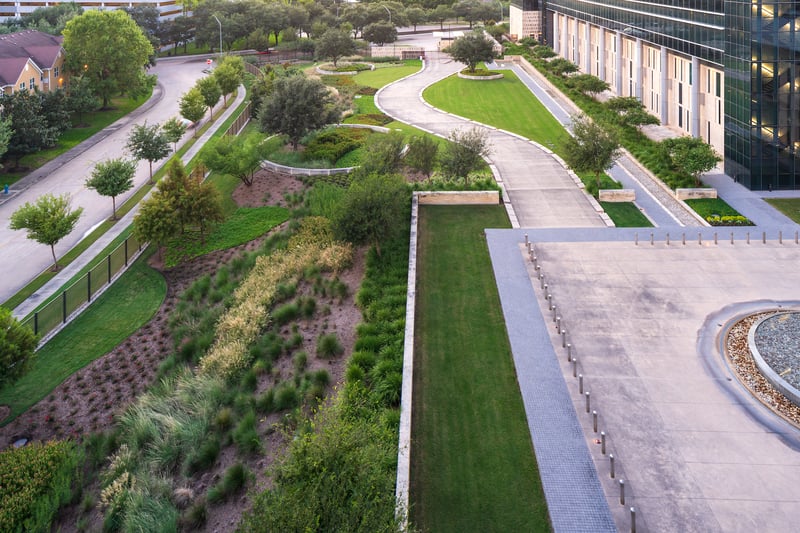 aerial photo of commercial property with several plantings and walkway