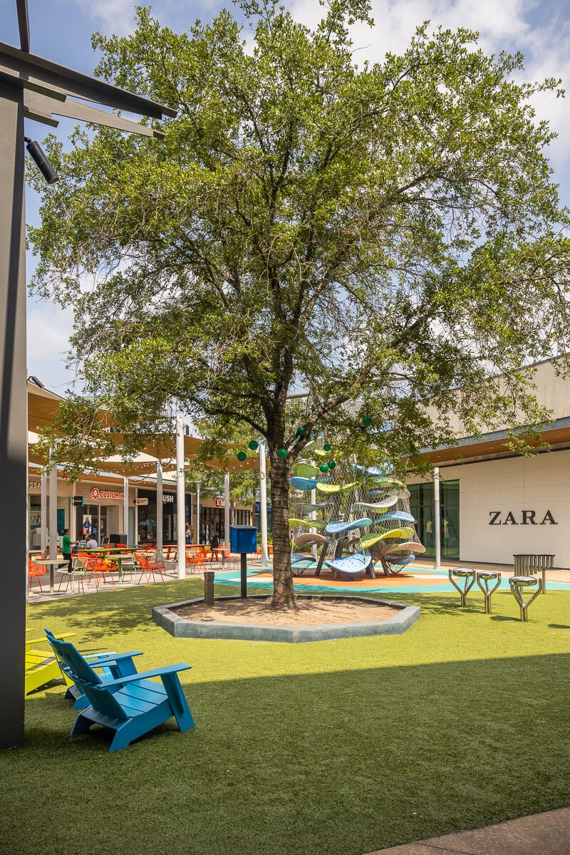 baybrook mall shopping center grass play area tree